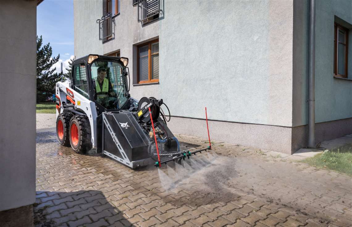 Bobcat's 250M Pressure Washer attachment