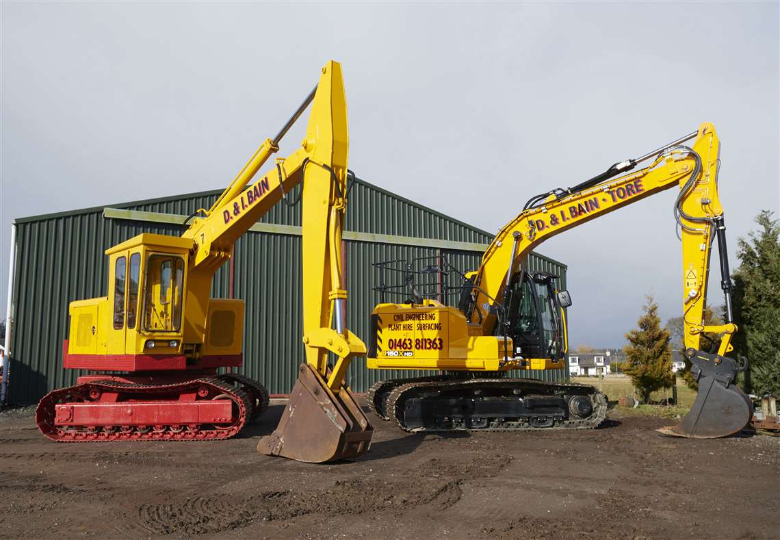 D&I Bain's new 150X HD model alongside its original 1966 HCB 7 excavator.