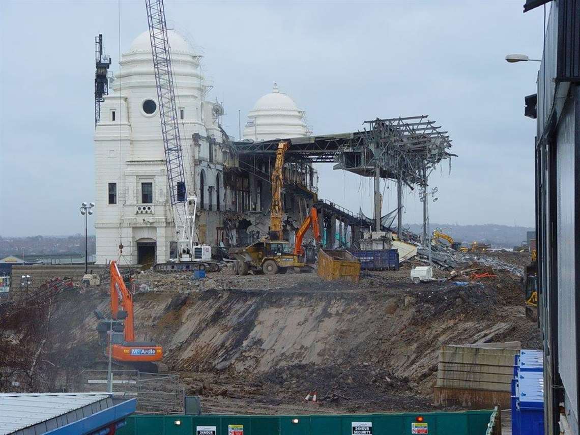 The north side of the stadium being taken down