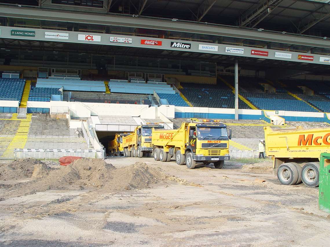 A fleet of McGee trucks enters Wembley Stadium