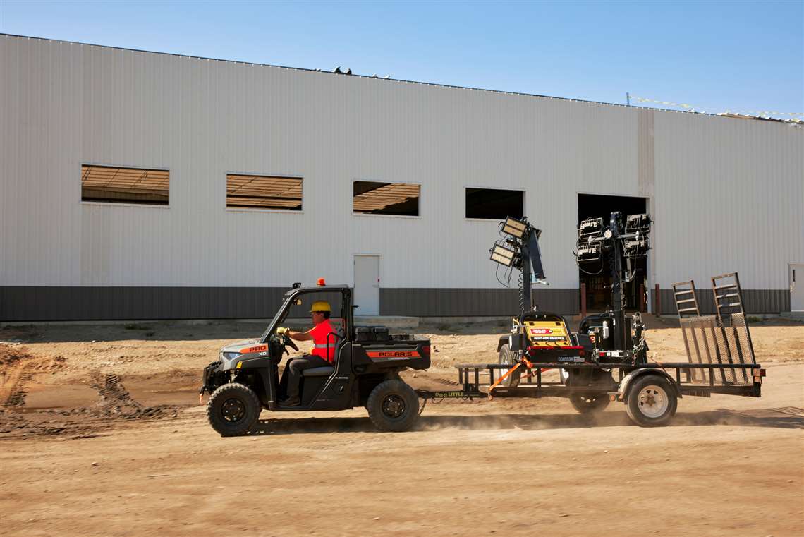 The Polaris Pro XD towing a lighting tower. (Photo: Polaris)