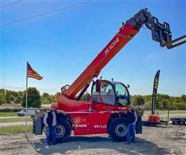 ENCON team members with a Magni Telehandler