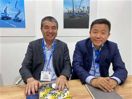 From left, Steven Liu, Sinoboom chairman, and Dawei He, overseas sales director, pictured at the APEX show in June 2023. (Photo: KHL)