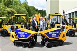 Gunn JCB Sales Director Mark Roberts (left) and Jewson Business Development Director Mark Esling (right) with the new fleet of JCB machines. (Photo: JCB)