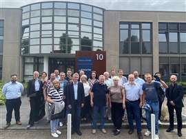 Members of the Ukranian delegation and Tsurumi outside the company's European headquarters. 