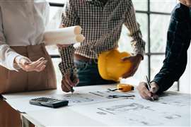 Construction workers planning