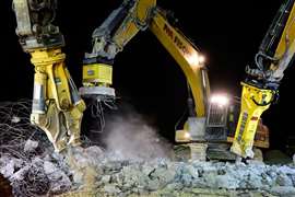 From left: A hydraulic cutter, magnet and breaker, each attached to an excavator, are some of Epiroc’s hydraulic attachment tools.   