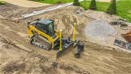 Une chargeuse compacte utilisant la plateforme de contrôle de nivellement Trimble Earthworks