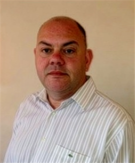 Neil Isaacs di Caterpillar