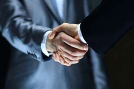 depositphotos_23185896-stock-photo-handshake-hand-holding-on-black