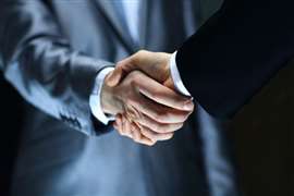 depositphotos_23185896-stock-photo-handshake-hand-holding-on-black