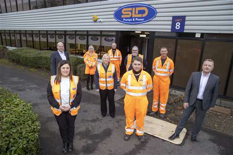 Frank Sprott (far right) with his team at the new SLD branch in Livingston, Scotland.