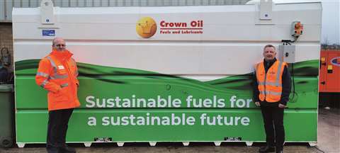 Left to Right: SLD’S Les Scott and Frank Sprott pictured alongside the storage tanks for HVO fuel at an SLD branch.
