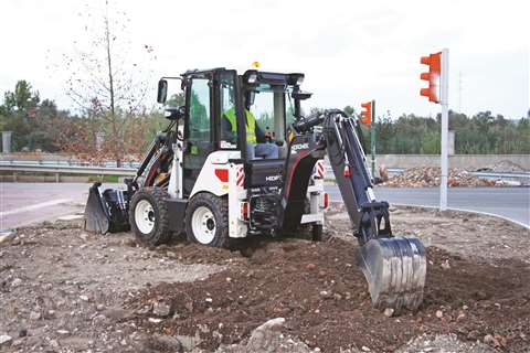 A backhoe loader on a building site