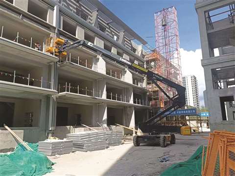 LiuGong boom lifts at work.