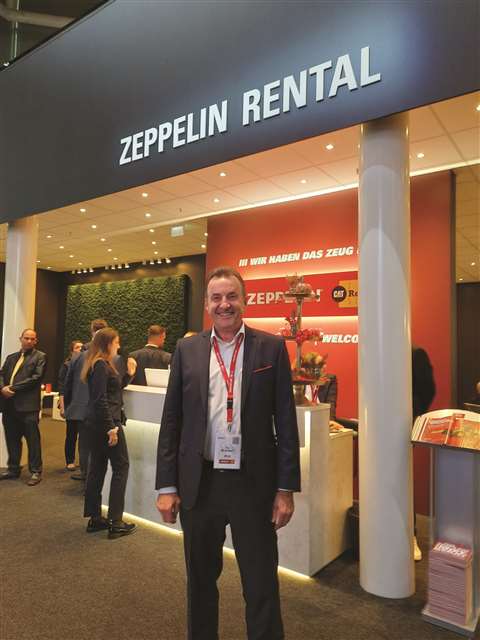 COO Peter Schrader on the Zeppelin Rental stand at Bauma 2022.