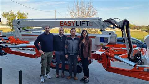 The Easy Lift and Macilft teams together at the equipment handover.