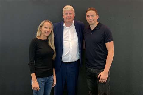 Snorkel's Henrik Skibsted (center) with Arturs Kavinskis (right) and Elina Kavinska (left) of Latteps