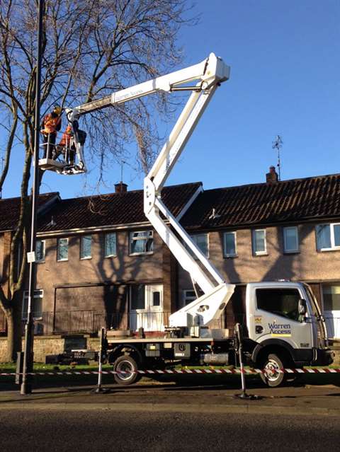 Warren Access Isoli PNT210 JD4 engaged in tree work