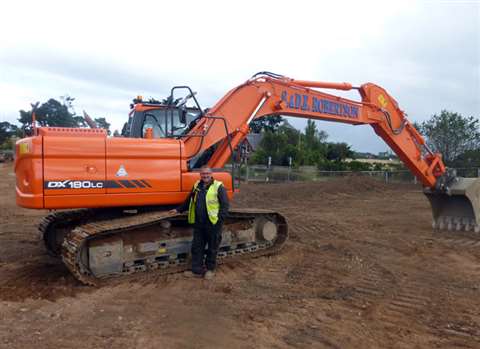 S &amp; DE Robertson managing director, Stuart Robertson, with the new Doosan DX180LC-3
