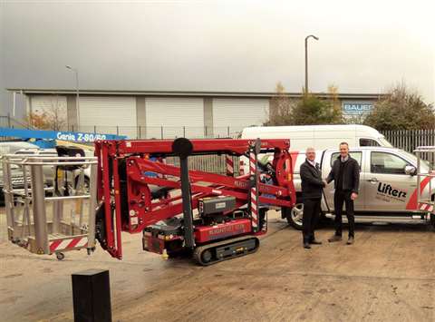 Mike Weatherill, APS, hands over a Hinowa boom to Liam Stericker of Lifterz.