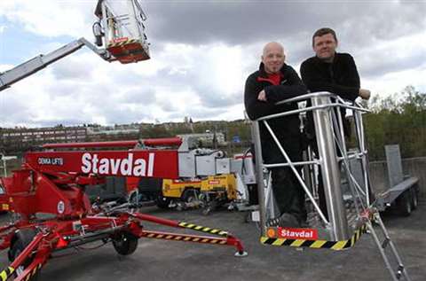 From left: Odd EWollberg, Stavdal;  and Ronny Aamodt, RGA Liftservice during the handover of two new