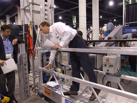 Todd King, general manager of suspended access company, Sky Climber, shows off its new Sky Master, a